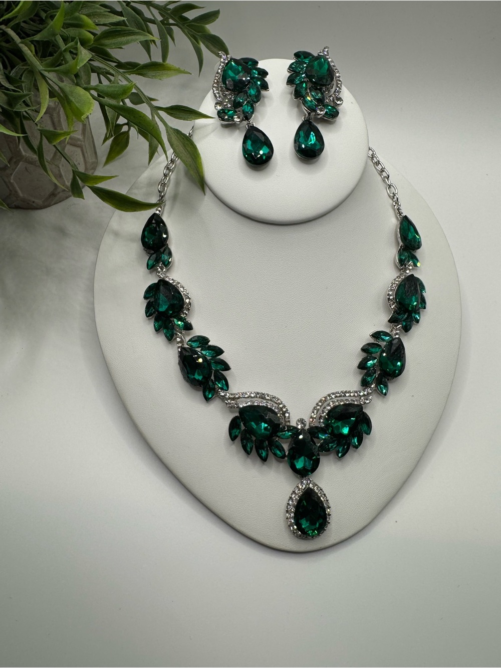Modern statement jewelry set, green and clear glass stones. Pierced earrings.
